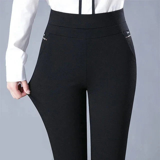 Elevate your style with our Stretch High Waist Skinny Leg Knit Slacks from Thread Harbor Clothing Company. These pants offer a sleek silhouette and a comfortable fit with their stretchy fabric and high waist design. Perfect for any occasion, they effortlessly flatter your figure while keeping you comfortable all day long.