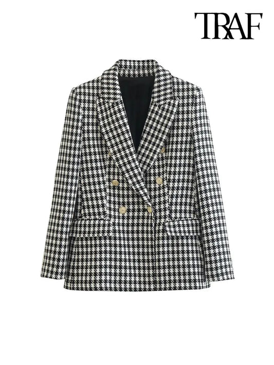 Make a statement with this Vintage Houndstooth Double Breasted Blazer and Skirt Set. The classic houndstooth pattern and double breasted design are sure to add a playful touch to any outfit. Plus, with flap pockets, you'll have plenty of room for your essentials. Perfect for those who don't take fashion too seriously.