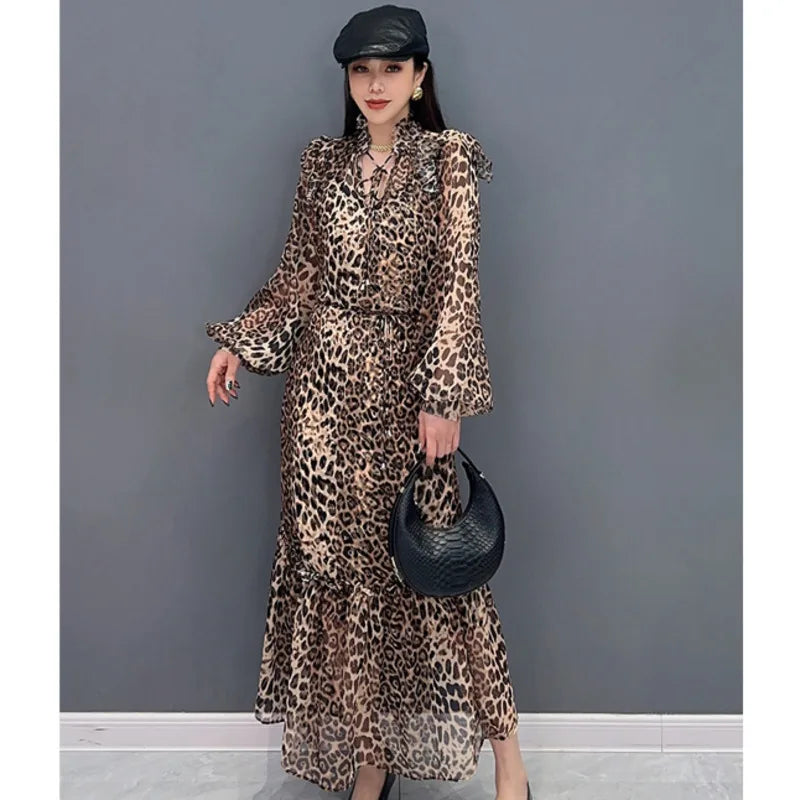 Indulge in fierce and feminine style with our Chiffon Leopard Print A Line Dress! The long, full ruffle edge sleeves with elastic wrist provide a chic and comfortable fit, while the spliced skirt adds a touch of drama. Embrace your wild side and turn heads with this statement-making dress.