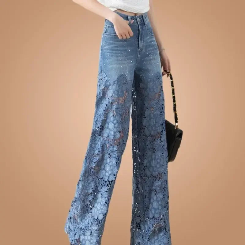 Enhance your style with our Elegant Lace High Waist Denim Jeans! Made with high-quality denim, these jeans offer a comfortable fit while the elegant lace detail adds a touch of sophistication. The high waist design flatters your figure and pairs perfectly with any top. Elevate your wardrobe today!