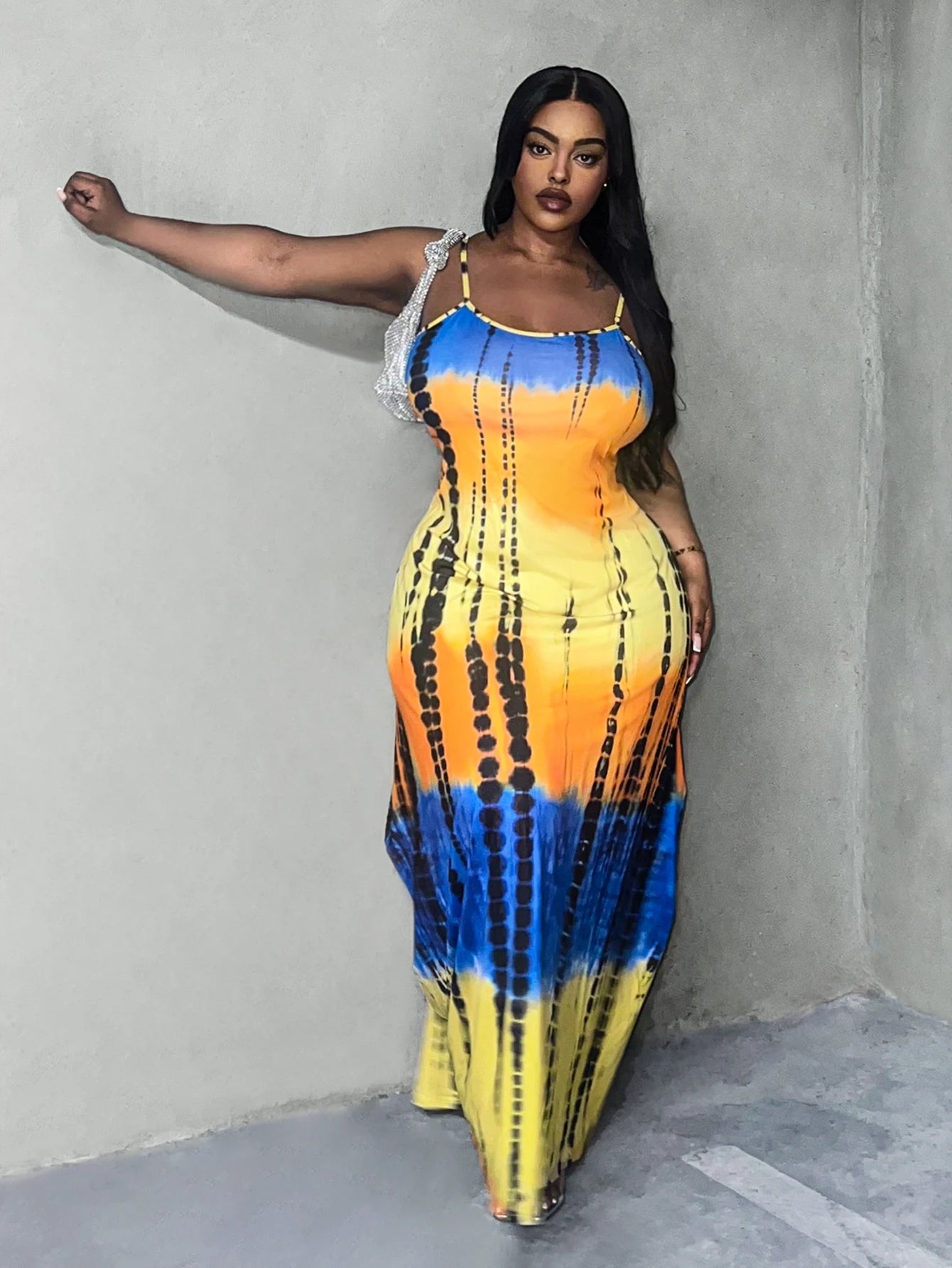 Elevate your style with our Plus Size Tie Dye Tank Maxi Dress! Designed for sizes 2XL-5XL, this dress features a gorgeous tie dye pattern and a flattering tank top silhouette. Perfect for any occasion, this dress will make you feel confident and stylish. Embrace your curves and stand out from the crowd with this must-have piece!