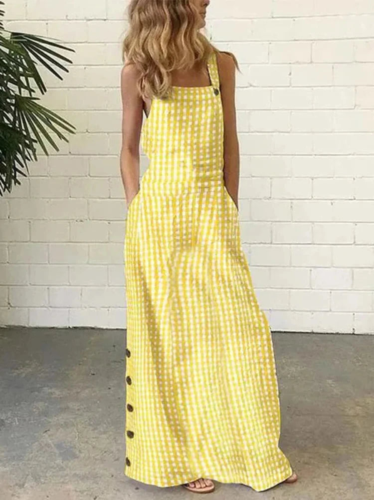 Yellow - So Summery and Fresh! - Elevate your summer wardrobe with our Bib Overall Style Maxi Dress! Available in vibrant Yellow or Blue Plaid, this statement piece from Thread Harbor Clothing Company combines the classic look of gingham with modern style. Decorative buttons down the sides add a touch of charm to this must-have dress. Feel confident and stylish in this bold and unique piece!