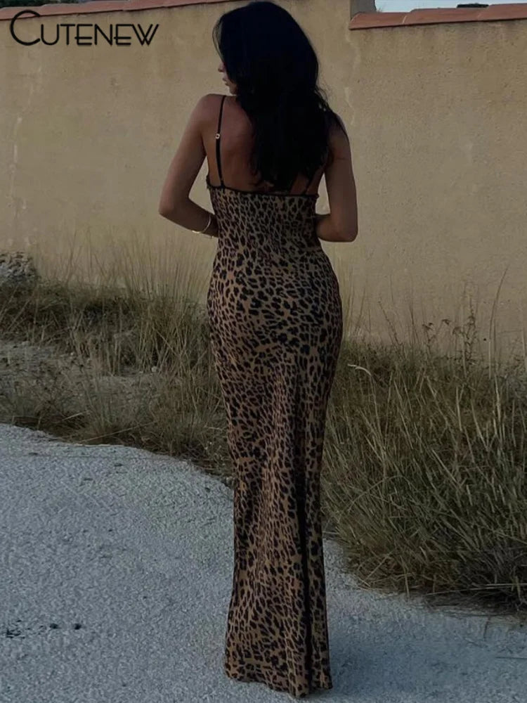 Embody the wild beauty of a leopard with our Sexy Leopard Print Maxi Dress. The low neckline and backless design will make you feel confident, while the front tie adds a touch of elegance. Perfect for a night out or a special occasion, this dress will make you stand out in any crowd!