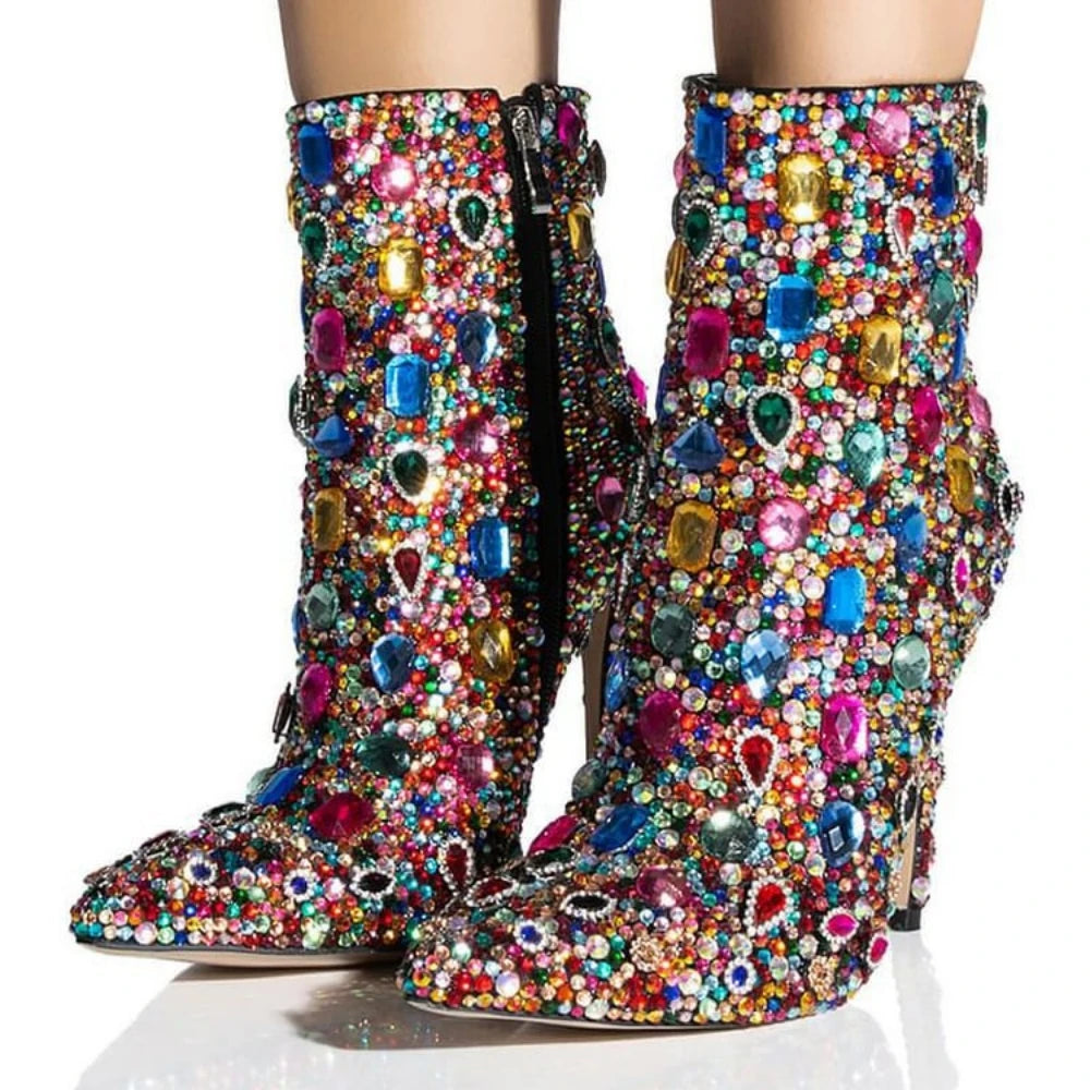 Walk with style in these luxurious Designer Women's Multi Colored Rhinestone Boots. The intricate rhinestone design adds a touch of elegance to any outfit, while the high-quality materials ensure durability and comfort. Elevate your wardrobe with these exclusive boots that are sure to turn heads.