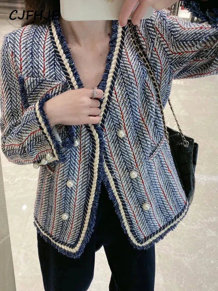 Elevate your wardrobe with our Casual Double Breasted Blue Tweed Crop Jacket! Made with premium tweed fabric, this jacket features delicate pearl buttons and a chic fringe hem. Perfect for any occasion, this versatile piece is a must-have for any fashion-forward individual. Step out in style with Thread Harbor Clothing Company.