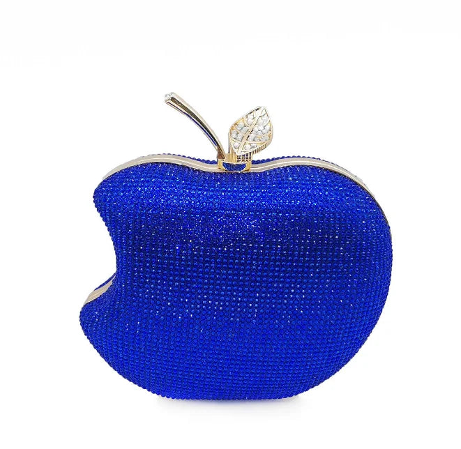    Get ready to shine with our Rhinestone Apple Novelty Clutch with Chain! The stunning rhinestone design adds a touch of glamour and the detachable chain allows for versatility in wearing. Perfect for a fun night out or a special occasion, this clutch is guaranteed to make a statement and turn heads!