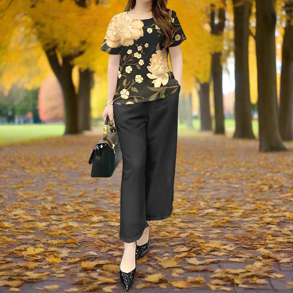 Black Slacks - The top is black with beautiful large flowers in gold - Stunning