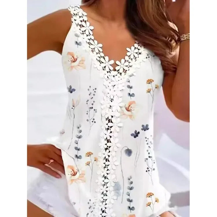 White background with blue and beige floral print.  There are no heart cut outs on this floral tank top. 