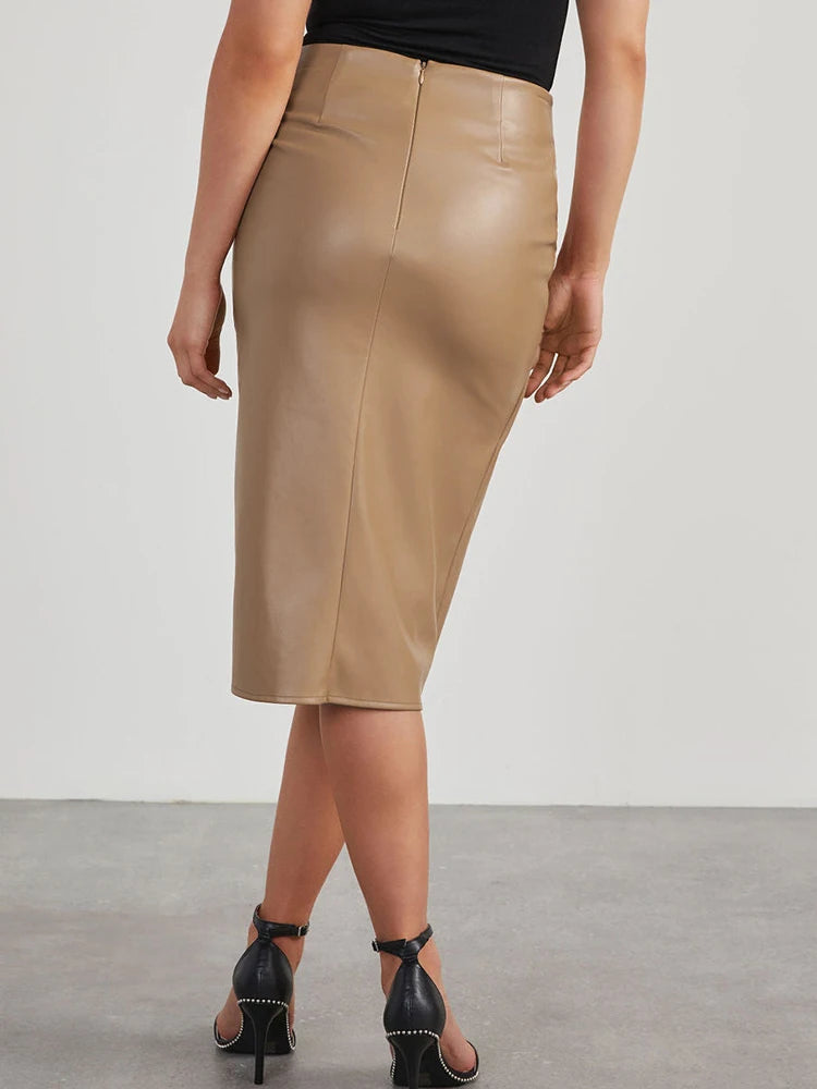 Unleash your inner vixen with our Sexy Faux Leather Mid Length Slit Twist Skirt! Perfect for a night out, this skirt combines the edginess of faux leather with a flirty twist design. Available in both classic black and bold brown, this skirt from Thread Harbor Clothing Company will have you turning heads.