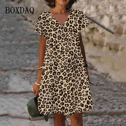 Add a touch of wild to your wardrobe with our Classic Leopard Print Short Sleeve Midi Dress. Made with high-quality material and featuring a chic leopard print design, this dress is both stylish and comfortable. Perfect for any occasion, it's sure to make a statement and turn heads. Unleash your inner fashionista with this must-have piece.