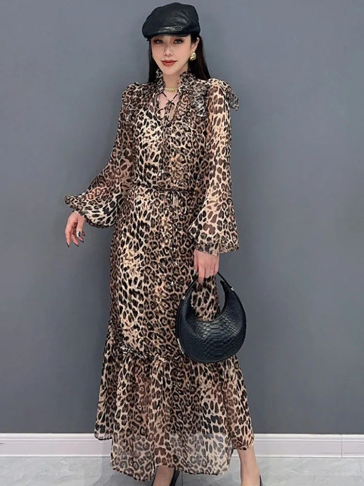 Indulge in fierce and feminine style with our Chiffon Leopard Print A Line Dress! The long, full ruffle edge sleeves with elastic wrist provide a chic and comfortable fit, while the spliced skirt adds a touch of drama. Embrace your wild side and turn heads with this statement-making dress.