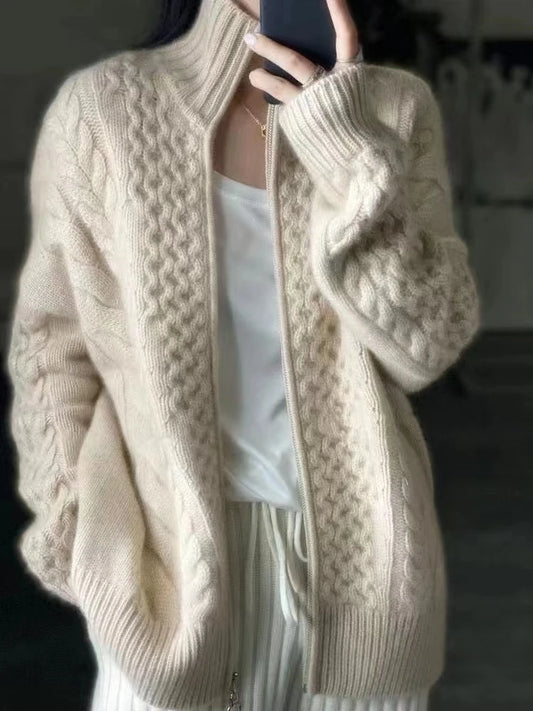 Stay warm and stylish in our 100% Wool Cable Knit Cardigan Sweater! The high neck and zipper front closure add a modern touch to this classic piece from Thread Harbor Clothing Company. Perfect for colder weather, this sweater will keep you cozy and on-trend