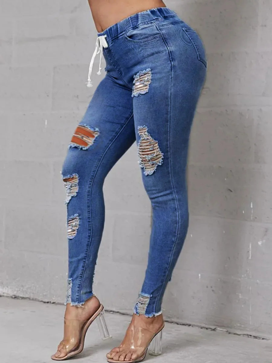 Rock your curves in our Plus Size High-Waist High Stretchy Distressed Denim Jeans! These stylish jeans provide a comfortable fit with their stretchy fabric, while the high-waisted design flatters your figure. The distressed detailing adds an edgy touch to any outfit. Say goodbye to uncomfortable jeans and hello to effortless style!