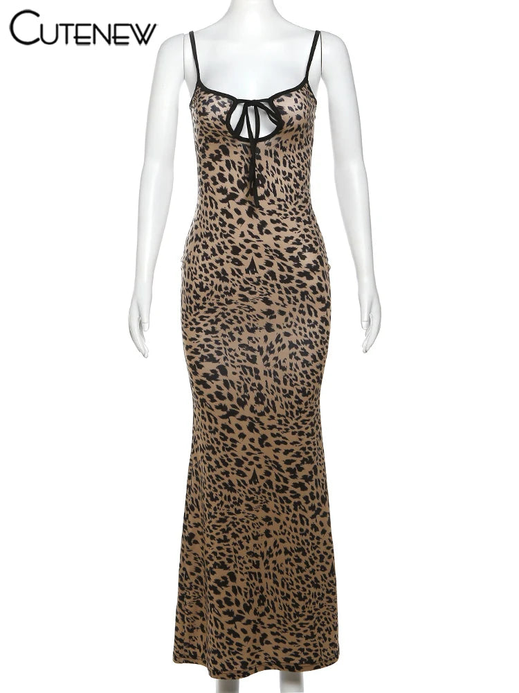 Embody the wild beauty of a leopard with our Sexy Leopard Print Maxi Dress. The low neckline and backless design will make you feel confident, while the front tie adds a touch of elegance. Perfect for a night out or a special occasion, this dress will make you stand out in any crowd!