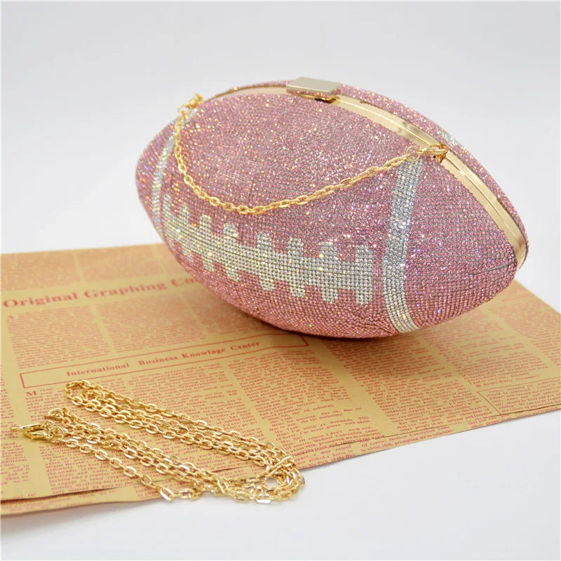 Add some glitz and glam to your game day outfit with our Ladies' Rhinestone Football Clutch! Perfect for carrying your essentials and showing off your team spirit, this clutch is sure to be a game day hit. Featuring stunning rhinestone details, it's the ultimate accessory for any football fan.