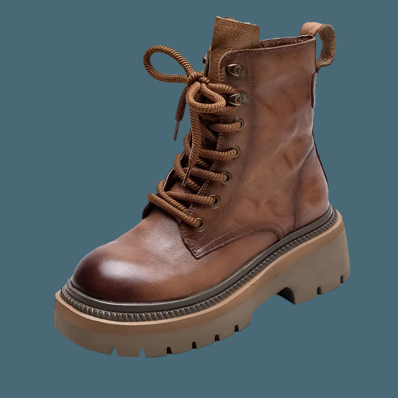 Experience the perfect combination of style and comfort with our Women's Leather Combat Boots. Made with high-quality leather, these boots come in a stunning brown and black color and feature lace-up detailing for a touch of edginess. Conquer any terrain with ease and stand out in these must-have boots.