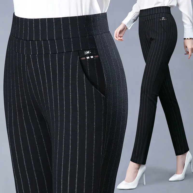 In black stripe - Elevate your style with our Stretch High Waist Skinny Leg Knit Slacks from Thread Harbor Clothing Company. These pants offer a sleek silhouette and a comfortable fit with their stretchy fabric and high waist design. Perfect for any occasion, they effortlessly flatter your figure while keeping you comfortable all day long.