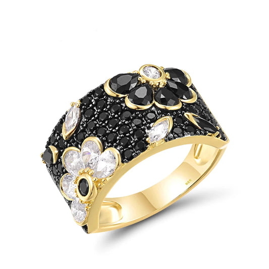 Indulge in luxury with our Super Chic Black Spinel and Sterling Silver Ring from Thread Harbor Clothing Company. The intricate floral design adds an elegant touch to any outfit. Made with high-quality materials, this ring will surely make a statement and elevate your style.