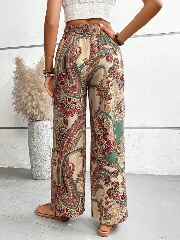 Make a statement with these retro, digital print high waist pants. Not only do they have an elastic waist for maximum comfort, but the wide leg style will give you a boho-chic look. Perfect for any casual occasion, these pants are a fun addition to any wardrobe. Go ahead, flaunt your unique style!