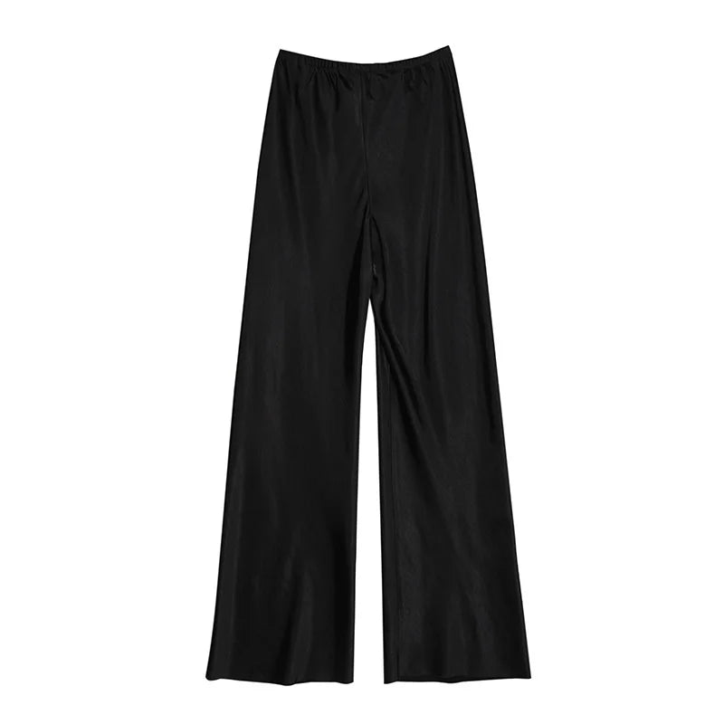 Introducing our Casual Long Wide Leg Elastic Waist Satin Trousers! Perfect for any casual occasion, these trousers offer comfort and style with its elastic waistband and wide leg design. Elevate your wardrobe with this must-have piece!