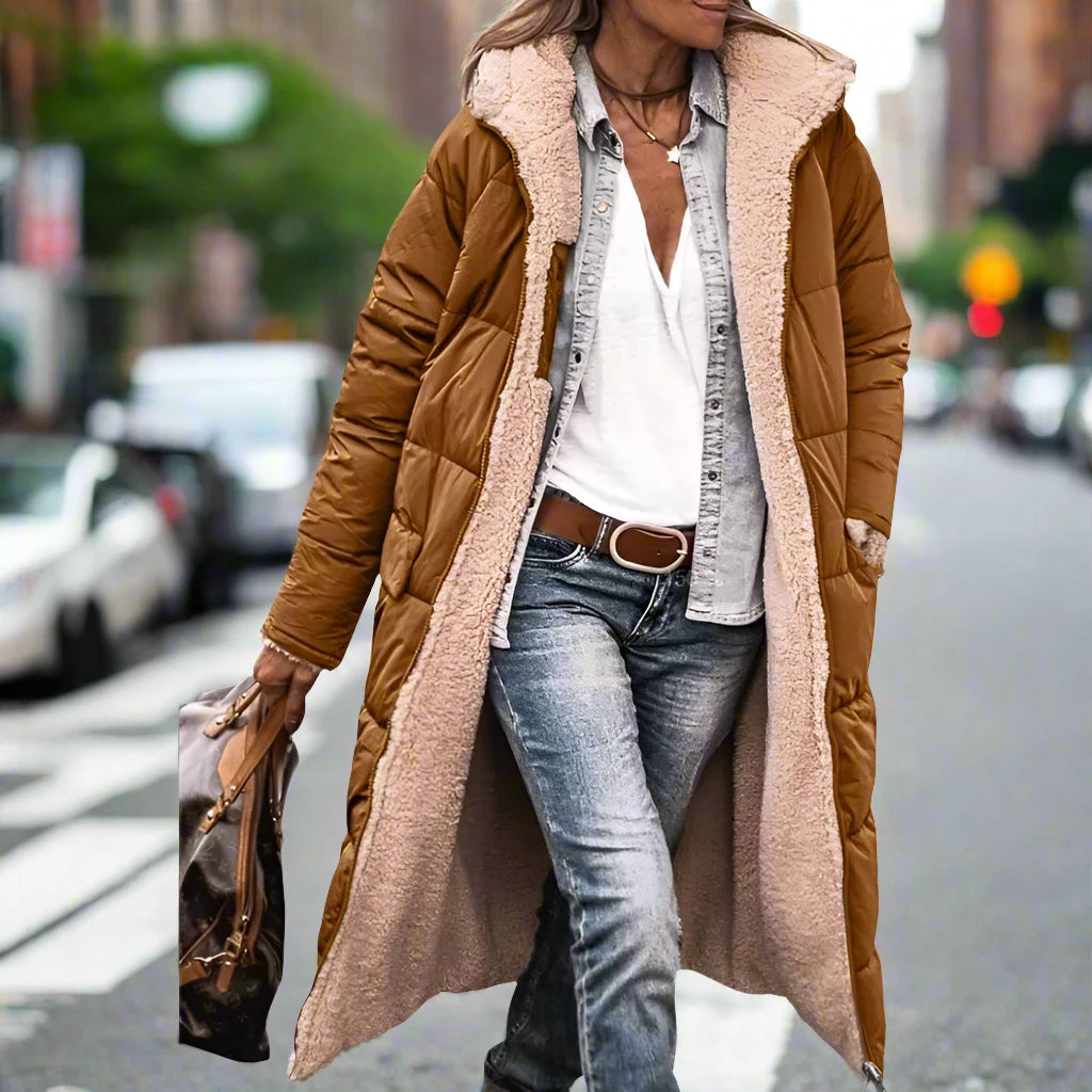 Coffee with beige fleece.  Keep cozy and stylish this winter with our Warm Winter Reversible Fleece Hooded Mid Length Puffer Coat. Featuring a reversible design and fleece lining, this coat is perfect for cold weather. Its mid length and puffer style adds a touch of fashion to keep you warm. Stay warm and fashionable all season long!