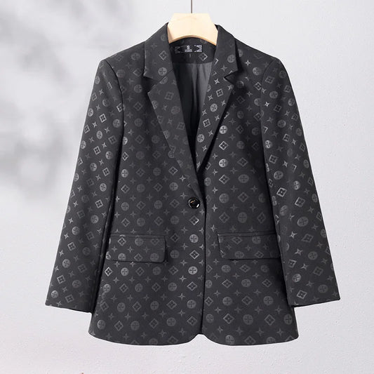 Elevate your wardrobe with our women's Louie Vuitton print blazer jacket in black and green. Stand out in luxury and style with the iconic Louie Vuitton print. Perfect for both casual and formal occasions, this blazer adds a touch of sophistication to any outfit. Make a statement and exude confidence.