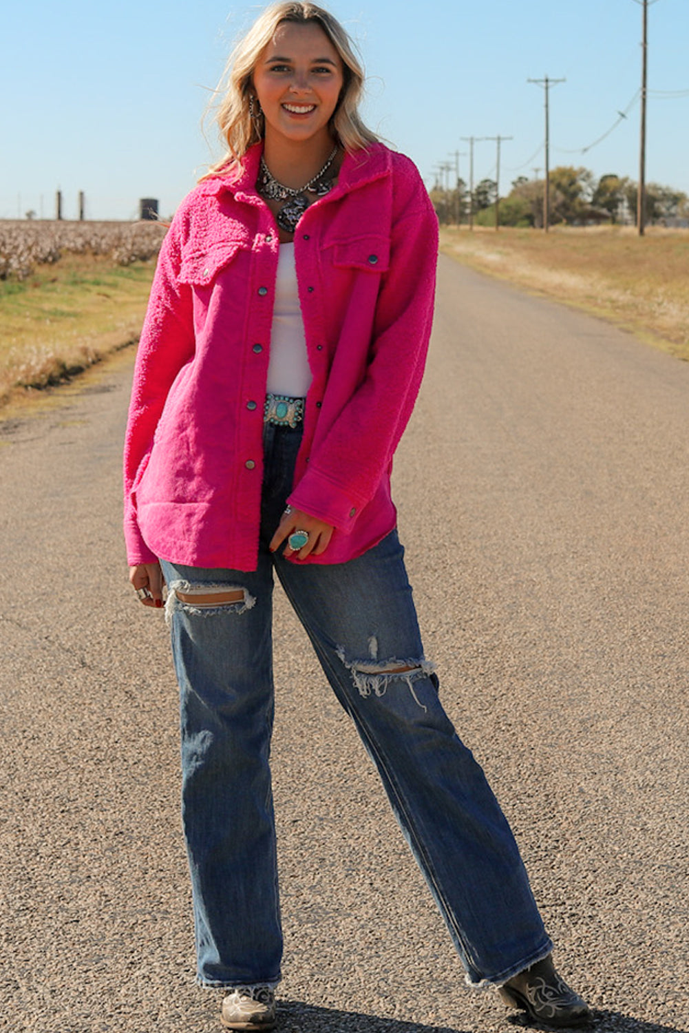 Introducing a cozy yet vibrant addition to your wardrobe: the Bright Pink Faux Suede Sherpa Button-Up Cardigan. Crafted with comfort and style in mind, this cardigan offers both warmth and flair, perfect for the modern woman who values both fashion and functionality