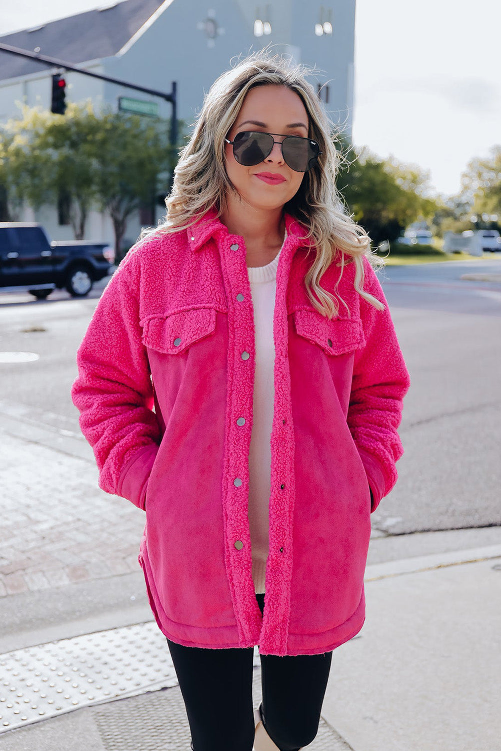 Introducing a cozy yet vibrant addition to your wardrobe: the Bright Pink Faux Suede Sherpa Button-Up Cardigan. Crafted with comfort and style in mind, this cardigan offers both warmth and flair, perfect for the modern woman who values both fashion and functionality