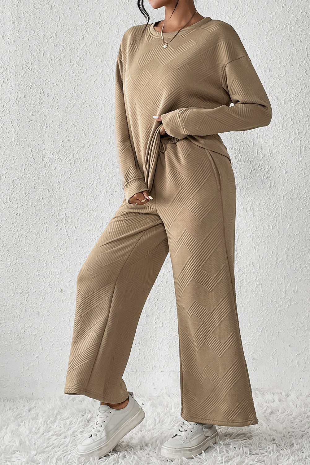 Transform your wardrobe with our Loose &amp; Comfy Khaki Wide Leg Outfit Set! Experience ultimate comfort and style with this versatile and chic set. Made with a loose and flowy design, it's perfect for any occasion. Upgrade your look and feel confident all day long.