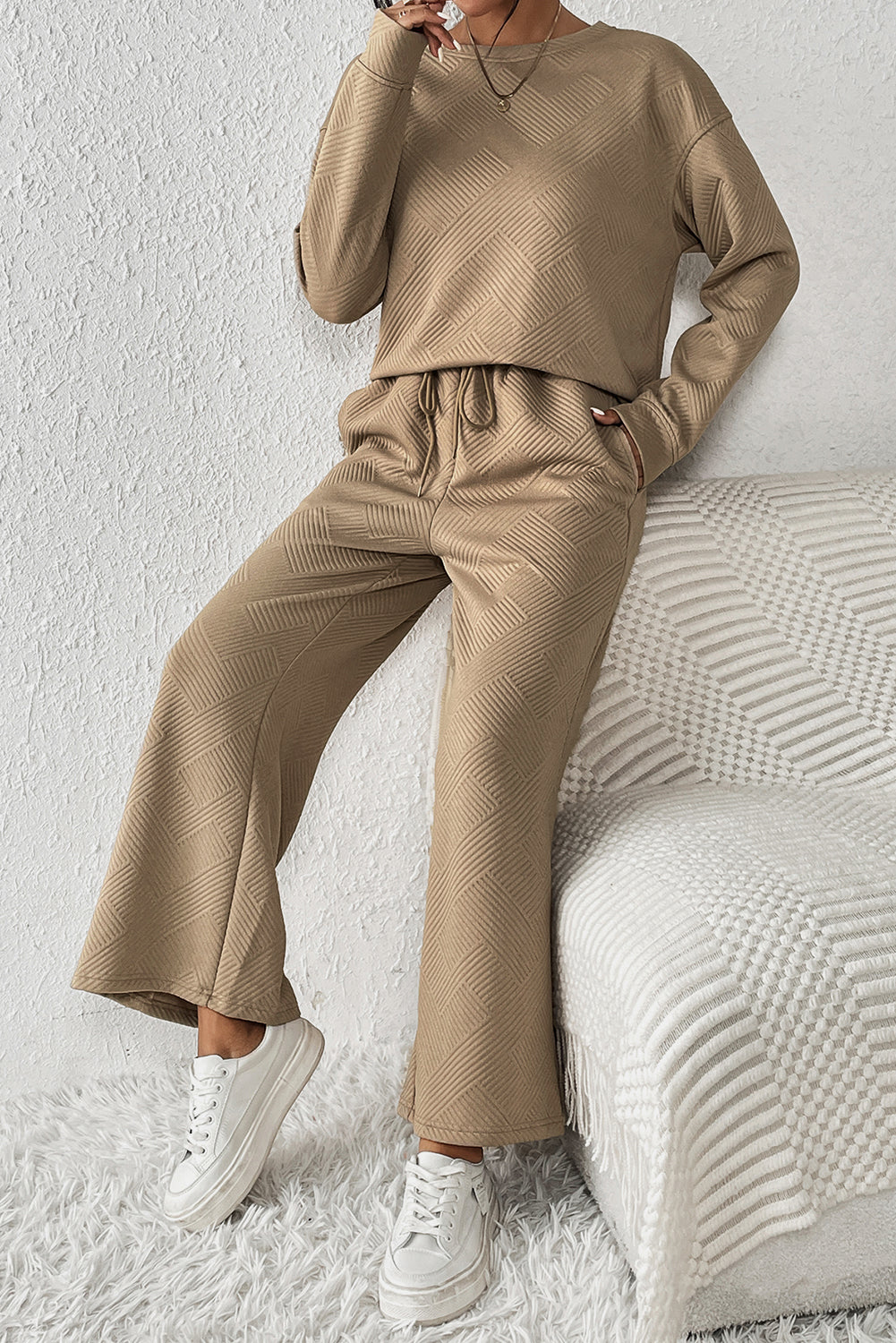 Transform your wardrobe with our Loose &amp; Comfy Khaki Wide Leg Outfit Set! Experience ultimate comfort and style with this versatile and chic set. Made with a loose and flowy design, it's perfect for any occasion. Upgrade your look and feel confident all day long.