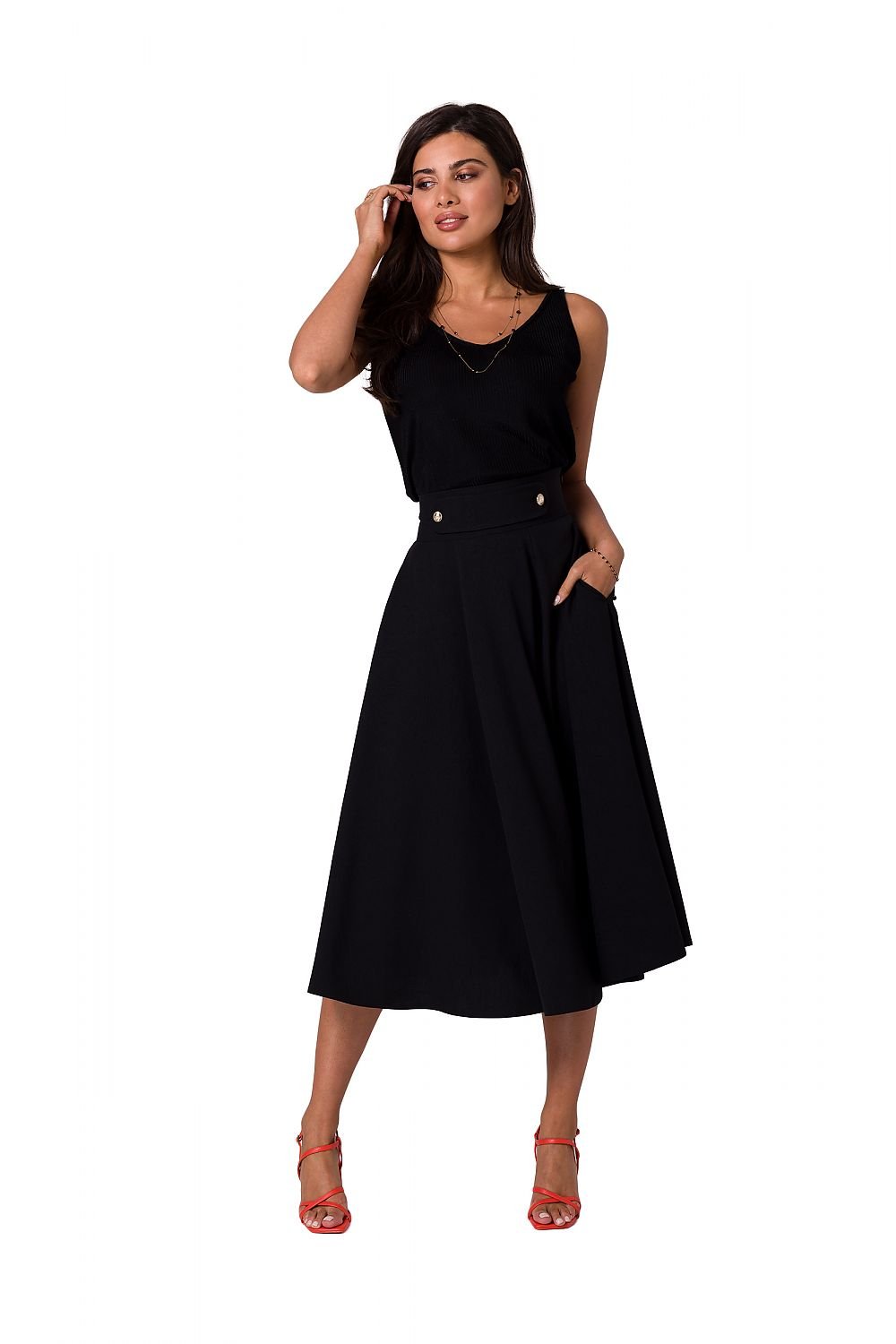 Experience effortless elegance with our Midi Elastic Waist Flared Women's Skirt. The high waist design and decorative buttons add a touch of sophistication, while the covered zipper ensures a secure fit. Flattering and versatile, this skirt will become a staple in your wardrobe.