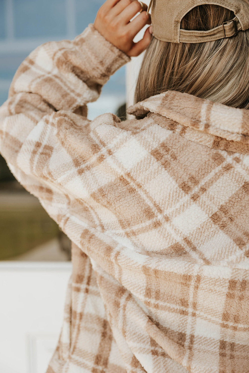 Stay warm and stylish with our Khaki Sherpa Plaid Button Pocketed Jacket. Made with soft sherpa, this jacket will keep you comfortable all day long. The spacious pockets allow for easy storage of essentials. Crafted with high-quality materials, you can count on this jacket to last. The classic plaid pattern and button front add a timeless touch to any outfit.