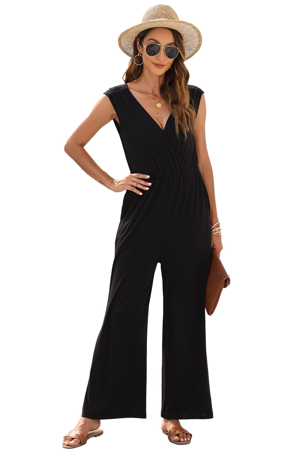 Get ready to turn heads with our Black Deep V Neck Pleated Crisscross Wide Leg Casual Backless Jumpsuit! This chic and versatile piece features a trendy deep v neck and a unique crisscross design, while the pleated details and wide leg cut give it a flattering and stylish look. Perfect for any occasion, from a casual day out to a night out on the town!