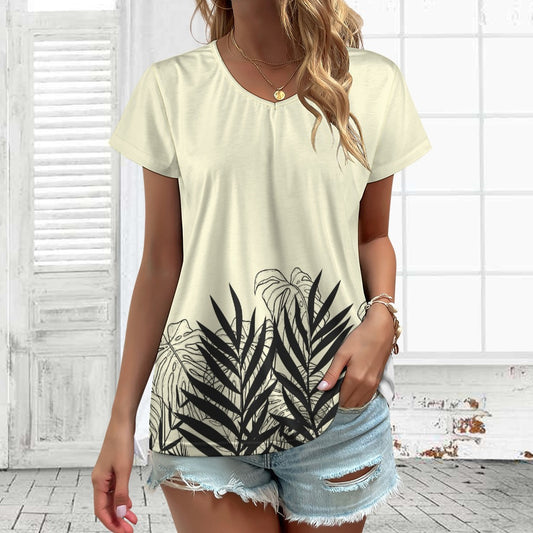 Elevate your style with our beige designer graphic V-neck short sleeve t-shirt and matching slacks. The black silhouette tropical leaf print adds a touch of tropical elegance to your look. Step into the world of effortless sophistication with this versatile and stylish outfit.
