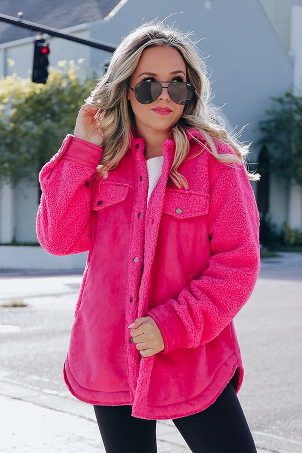 Introducing a cozy yet vibrant addition to your wardrobe: the Bright Pink Faux Suede Sherpa Button-Up Cardigan. Crafted with comfort and style in mind, this cardigan offers both warmth and flair, perfect for the modern woman who values both fashion and functionality