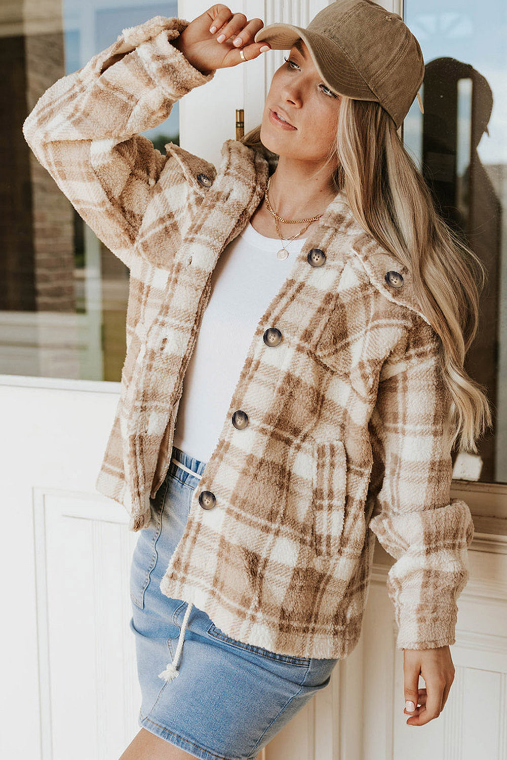 Stay warm and stylish with our Khaki Sherpa Plaid Button Pocketed Jacket. Made with soft sherpa, this jacket will keep you comfortable all day long. The spacious pockets allow for easy storage of essentials. Crafted with high-quality materials, you can count on this jacket to last. The classic plaid pattern and button front add a timeless touch to any outfit.