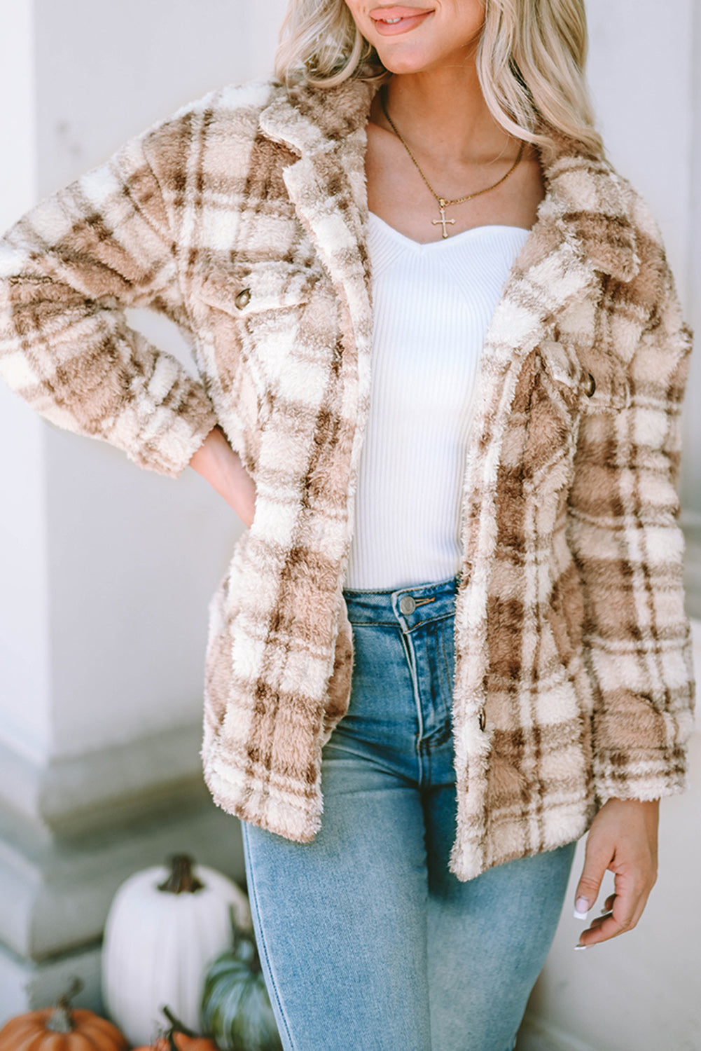 Stay warm and stylish with our Khaki Sherpa Plaid Button Pocketed Jacket. Made with soft sherpa, this jacket will keep you comfortable all day long. The spacious pockets allow for easy storage of essentials. Crafted with high-quality materials, you can count on this jacket to last. The classic plaid pattern and button front add a timeless touch to any outfit.